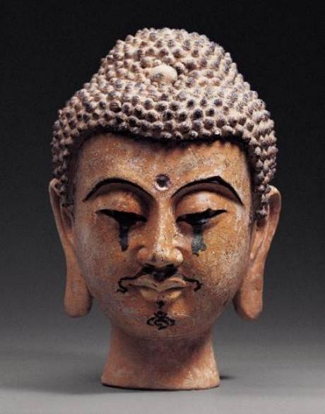 贺兰县宏佛塔天宫中曾出土六尊西夏泥塑佛头残像,造型完好者仅两尊.